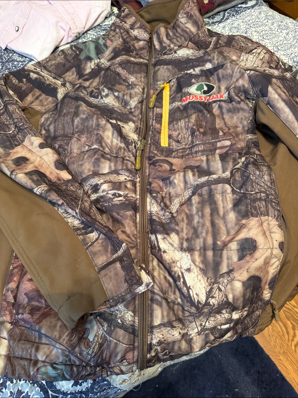 Mossy Oak Camouflage Jacket with Brown Panels and Yellow Accents